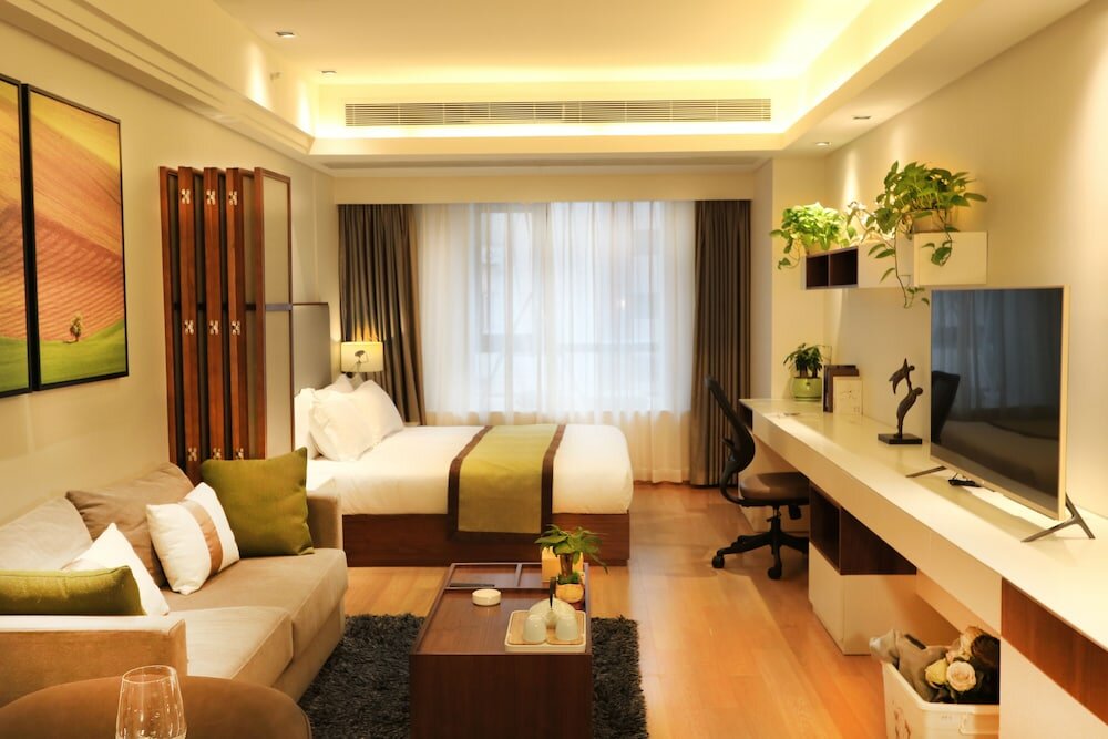 Фото Yujia Service Apartment Hebao Road