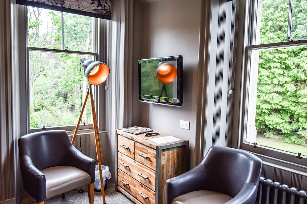 Фото Craigmhor Lodge & Courtyard