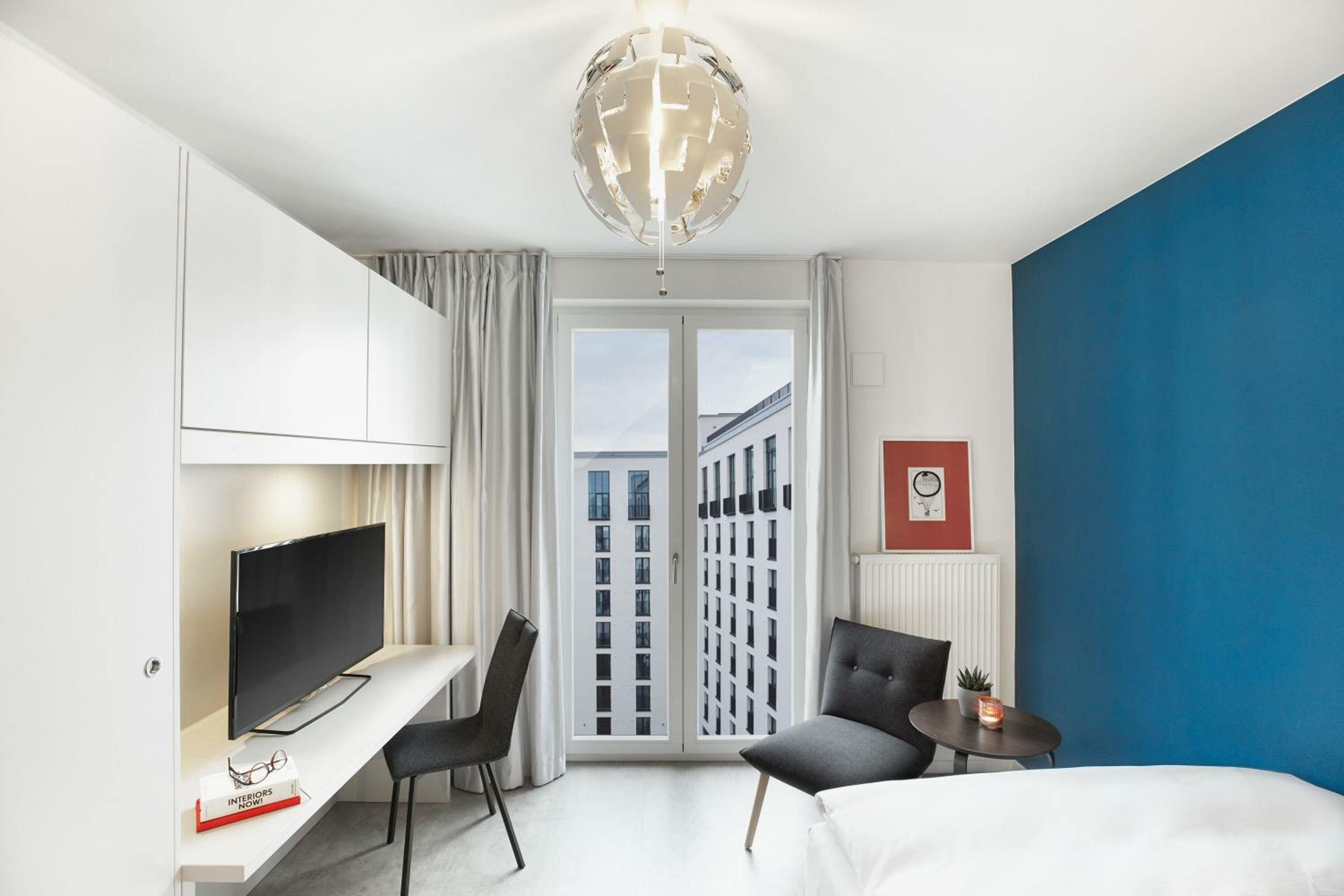 Фото H. ome Serviced Apartments München