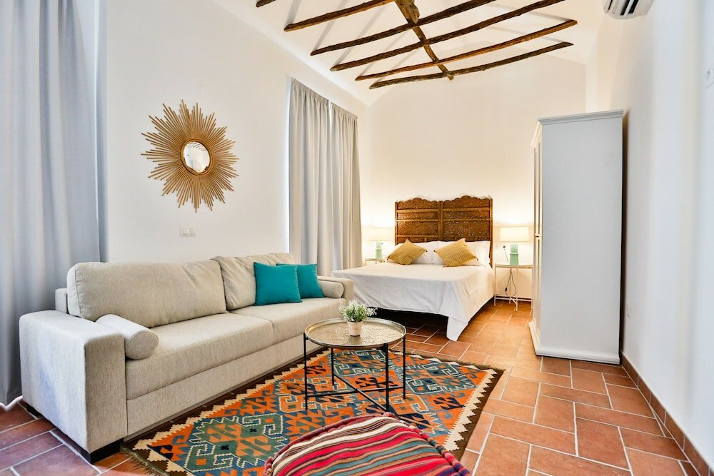 Фото Apartamentos Puerta Sevilla De Cordoba