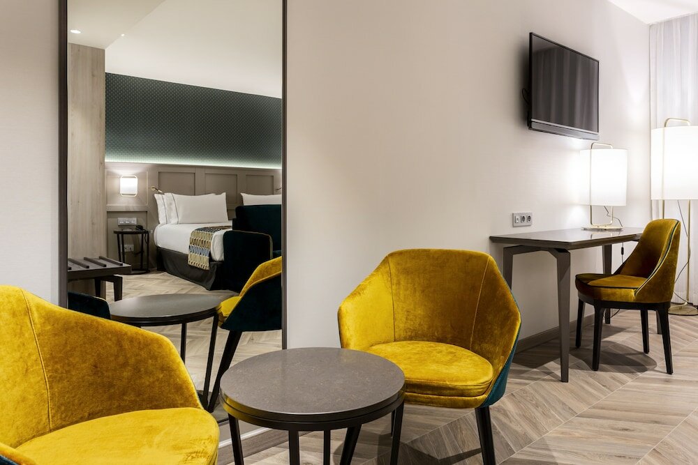 Фото Eurostars Puerta Real Hotel