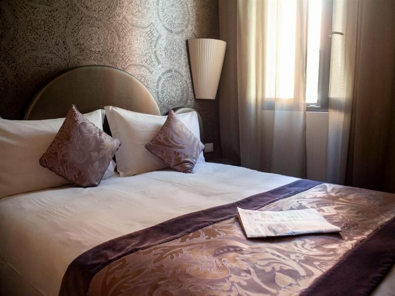 Фото Alle Guglie Boutique Hotel