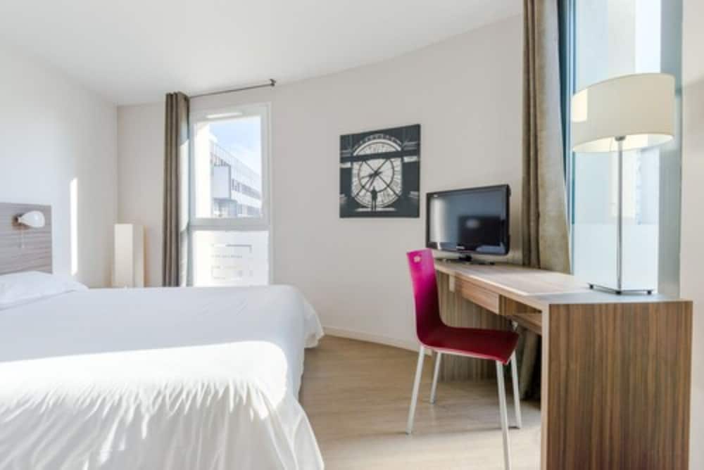 Фото Hévéa Appart Hôtel