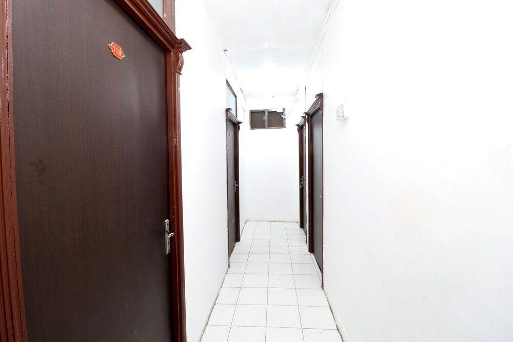 Фото Oyo 30274 Temple City Guest House