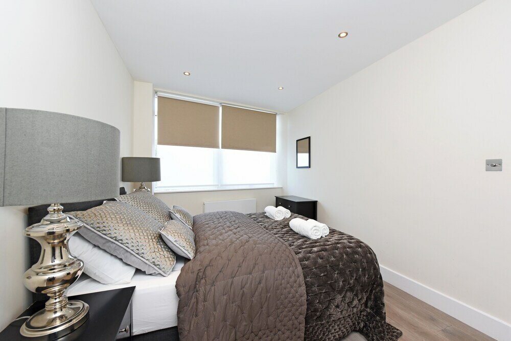 Фото The Glasshouse Apartments