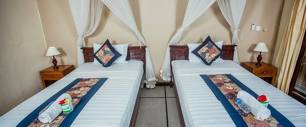 Фото Pondok Kutuh Guesthouse