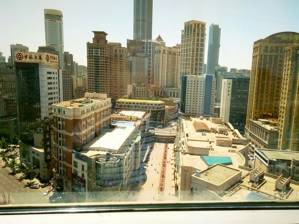 Фото Dalian Xiuzhu Building Apartment