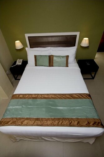Гостиница Mango Suites - Tuguegarao в Провинции Кагаян