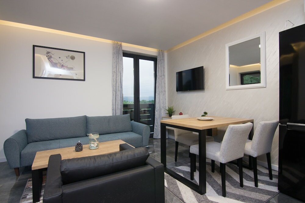 Фото Deluxe Feliciano Apartments