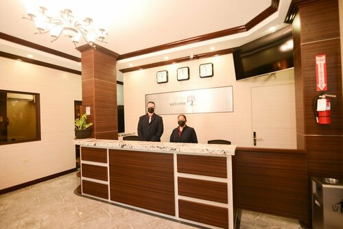 Гостиница The Caye Hotel