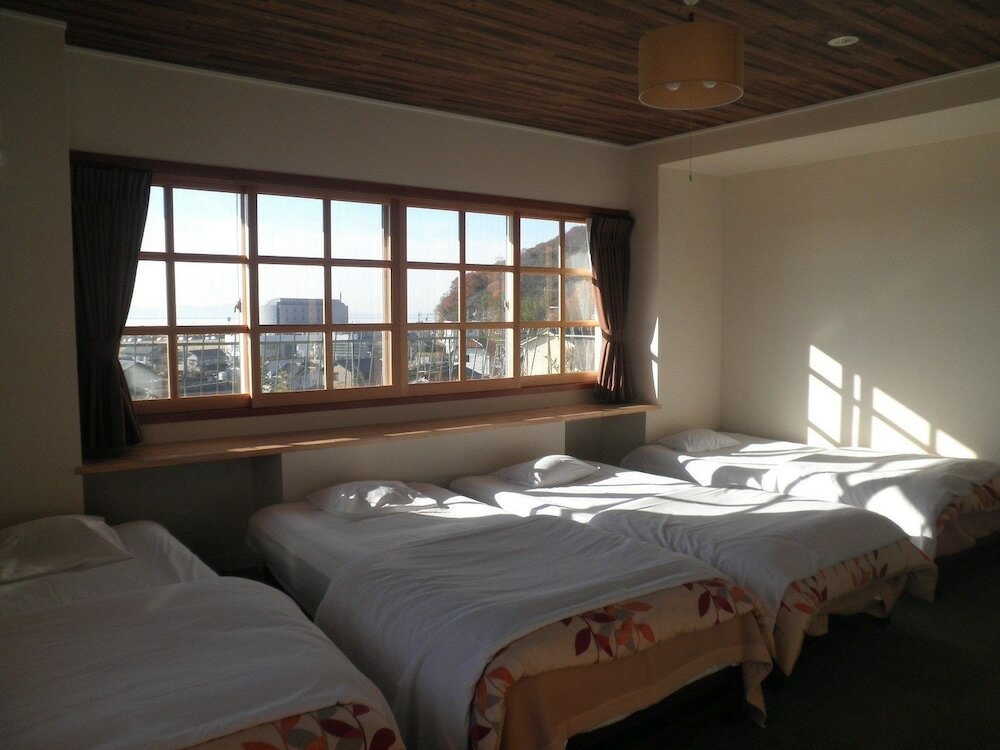 Фото Gamagori Orange Pension