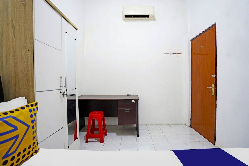 Фото Spot On 91360 Swk 68 Syariah