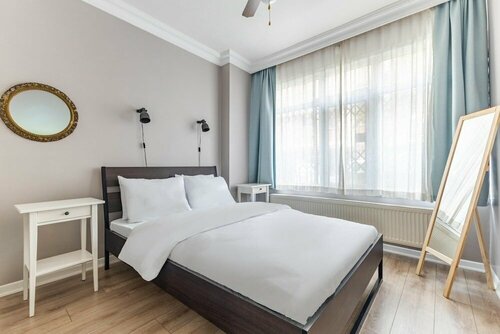 Апартаменты Comfortable House With a Cute Backyard in Kadikoy в Кадыкёй