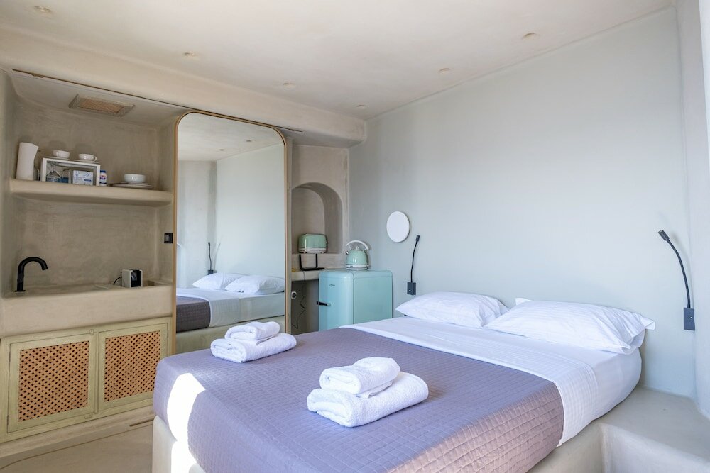 Фото SantorOia Luxury Suites