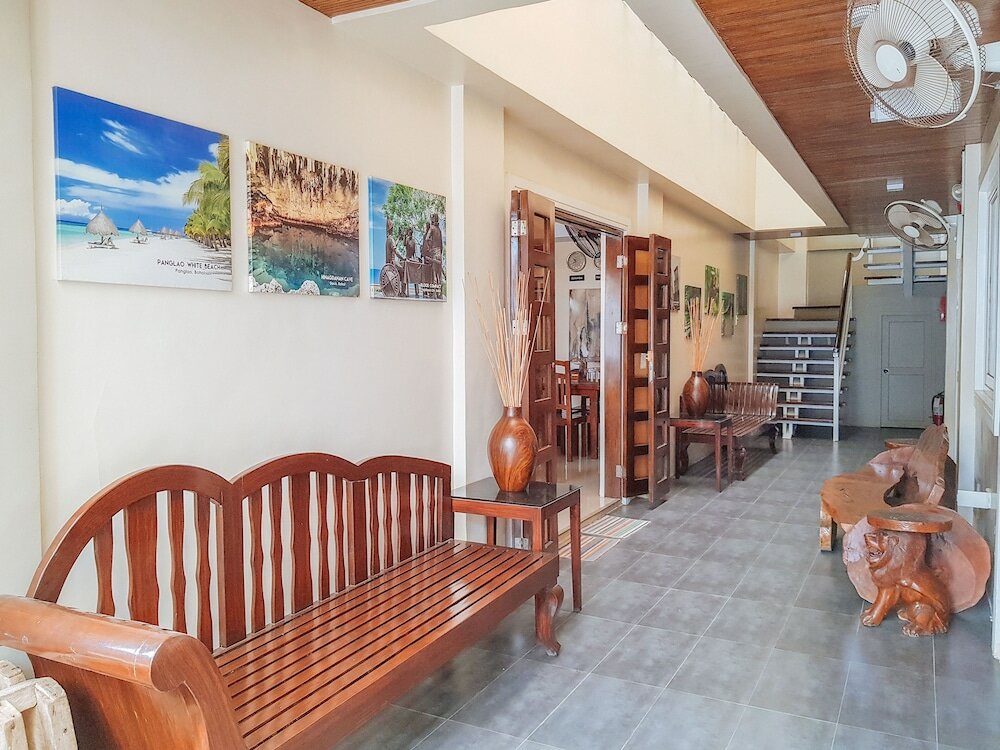 Фото RedDoorz @ Caimito Drive Dampas