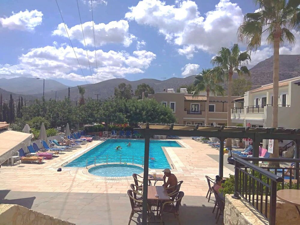 Фото Dionysos Apartments & Studios