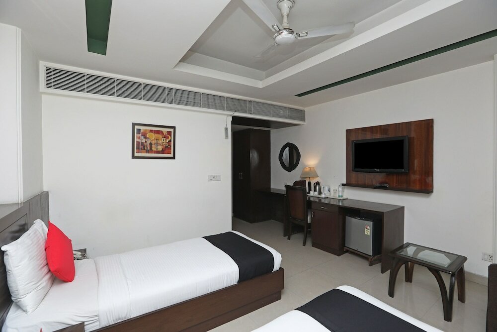 Фото Capital O 445 Impress Hotel