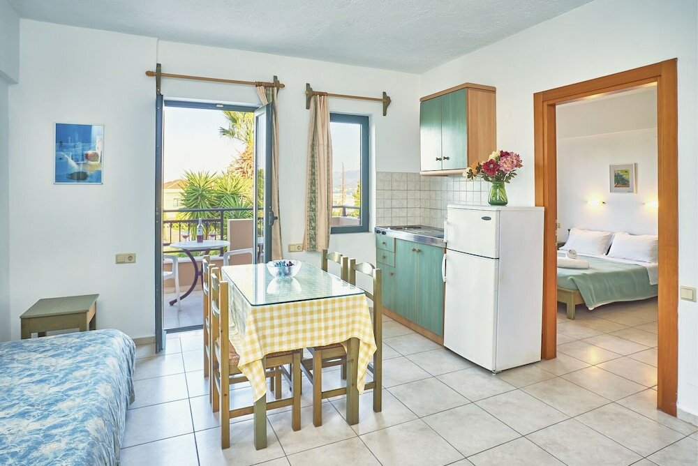 Фото Dionysos Apartments & Studios