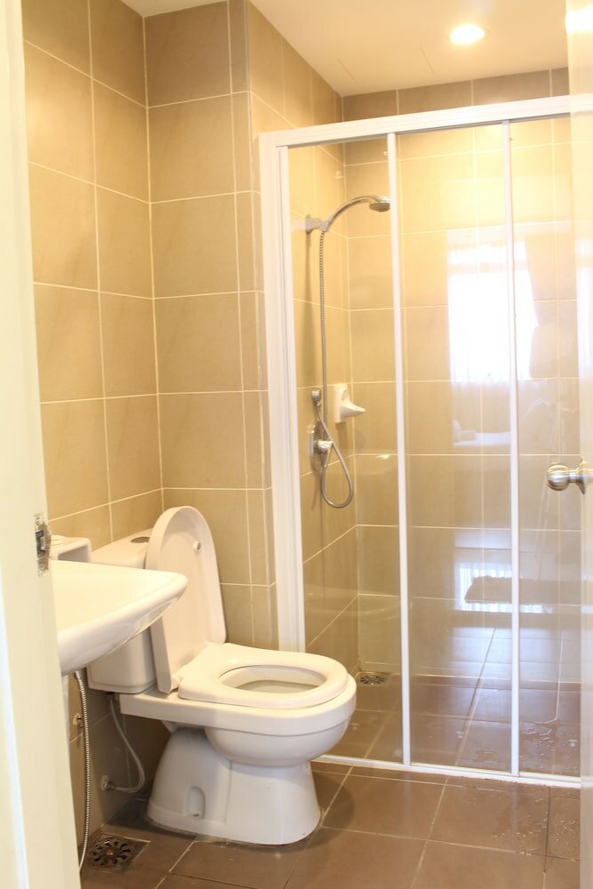 Фото Peaceful Service Suites at Taragon Puteri Bintang