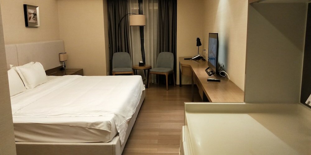 Фото Yuwa Serviced ApartHotel