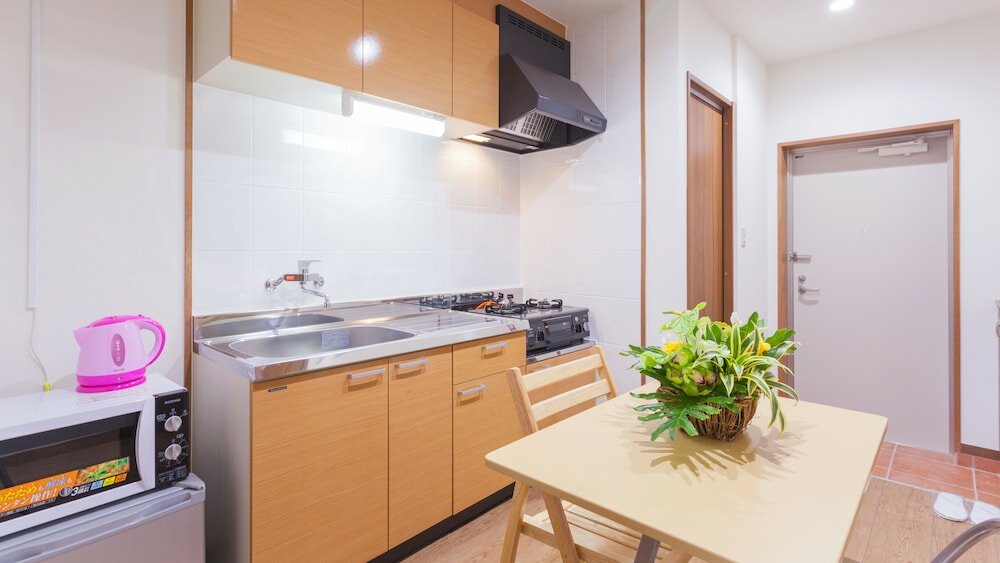 Фото Kariyushi Condominium Resort Kin Yaka Seaside