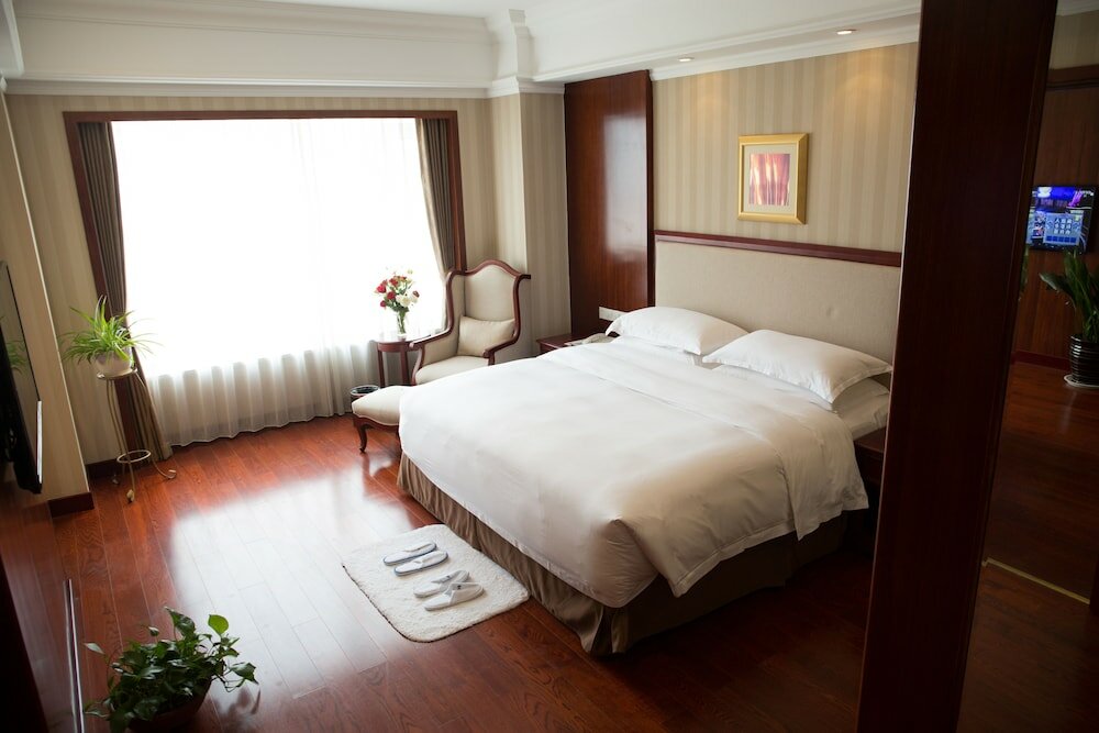 Фото Enrichee Gloria Plaza Hotel Qingdao