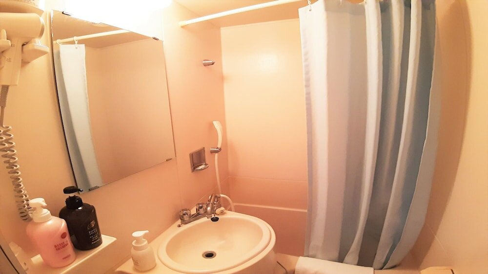 Фото Isahaya Station Hotel