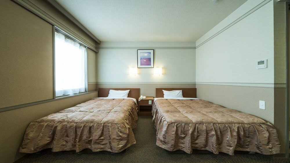 Фото Isahaya Station Hotel