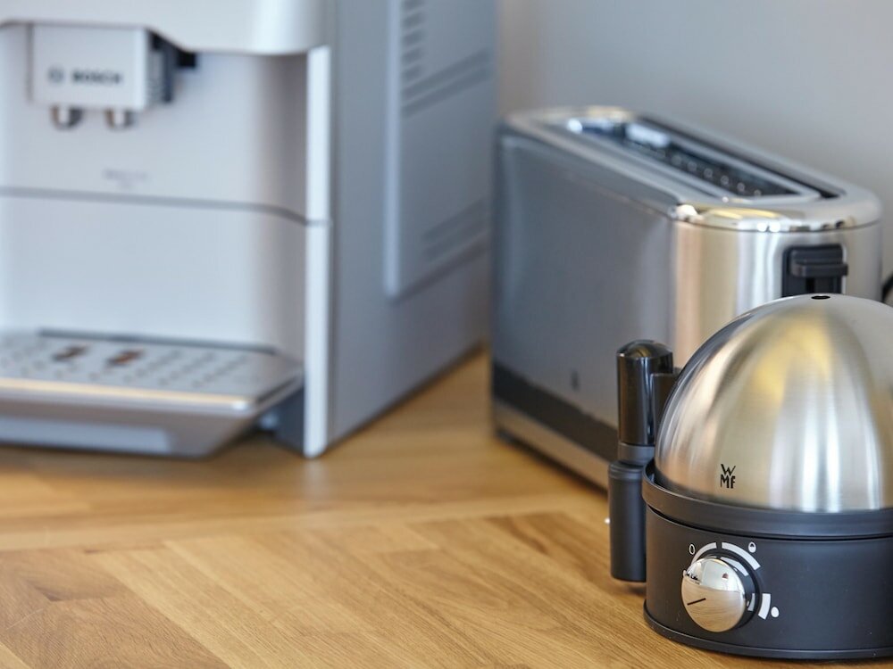 Фото Ferienhaus & Appartments Düneneck 8