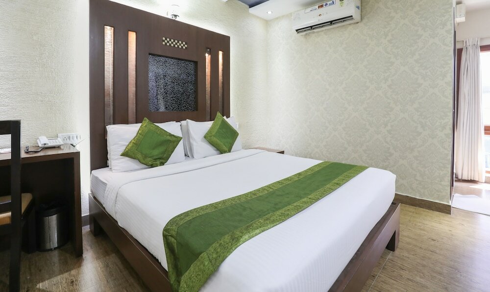 Фото Treebo Select Grand Premier Suites