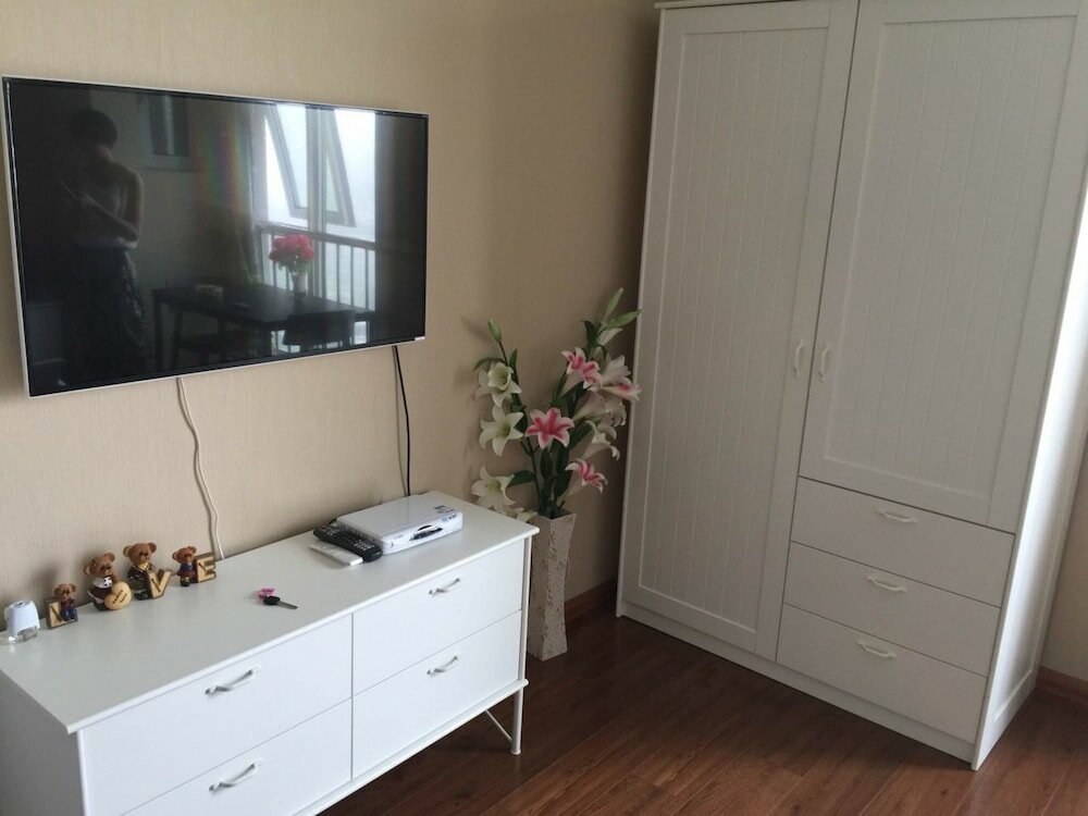 Фото Dalian Aolai Hotel Apartment