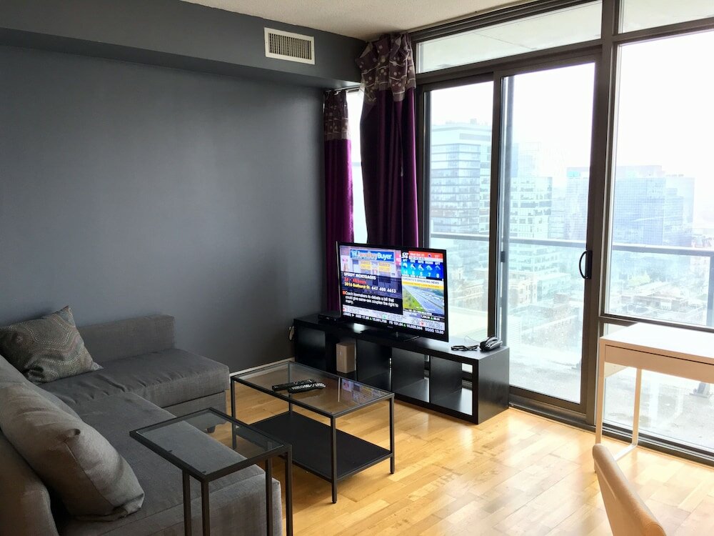 Фото Altitude Suites Bay Street by Teristo Group