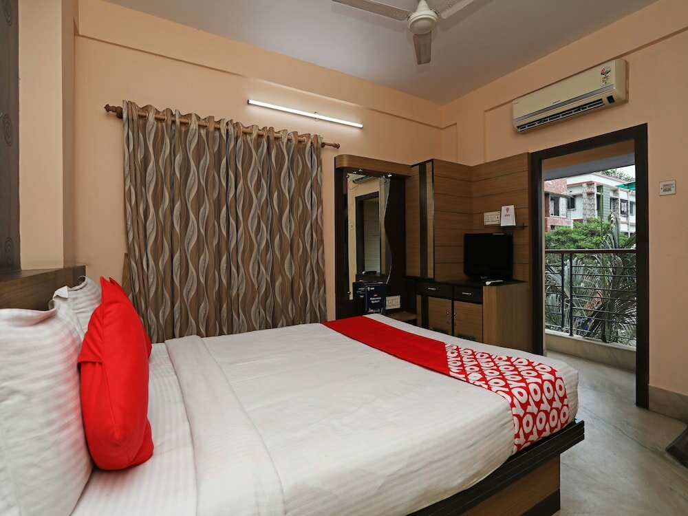 Фото Oyo 6606 Seacom Inn Purbadiganta