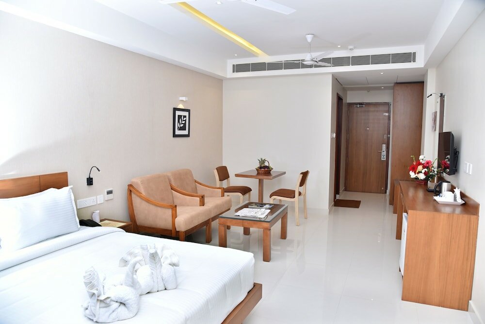 Фото Navaratna Inn A Luxury Hotel
