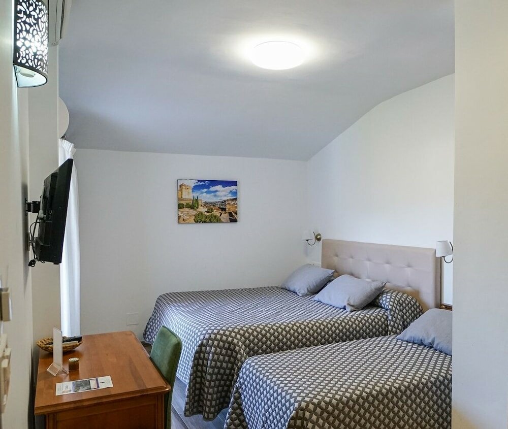 Фото Hostal y Apartamento Rural Los Naranjos