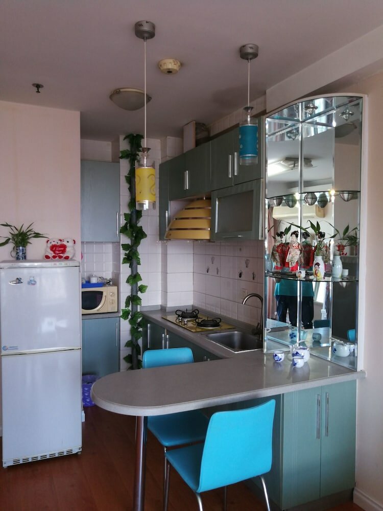 Фото Dalian Xiuzhu Building Apartment