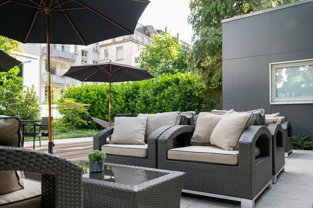 Фото Qube Hotel Bergheim