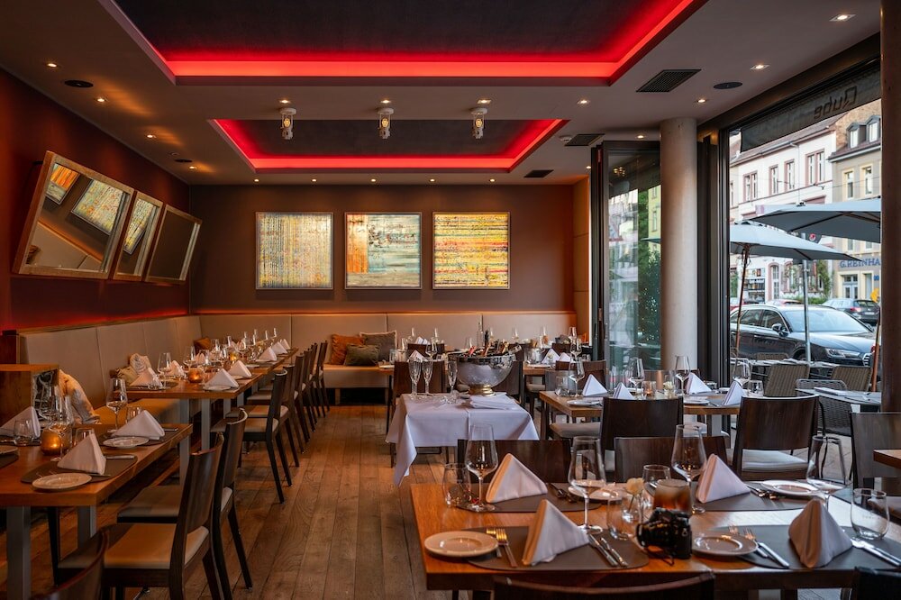 Фото Qube Hotel Bergheim