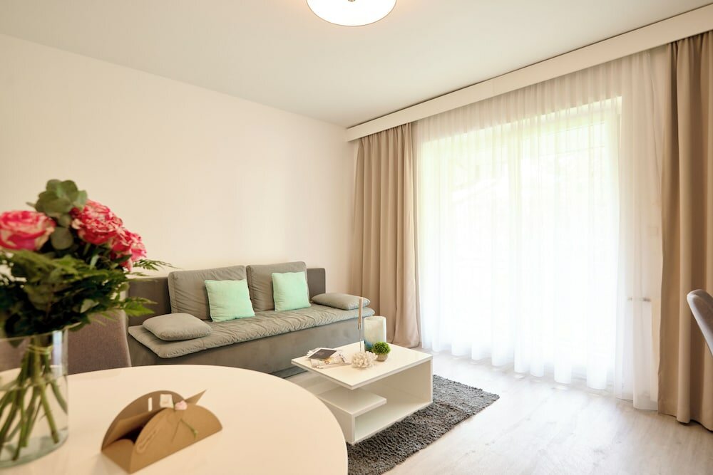 Фото Ferienwohnungen - Appartements Pension Zollner