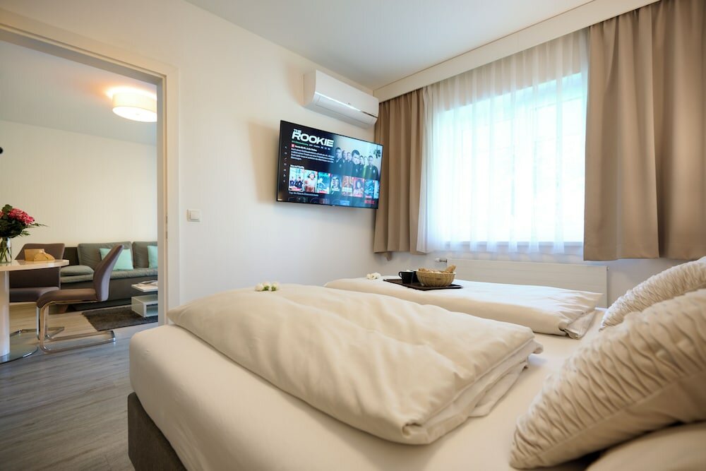 Фото Ferienwohnungen - Appartements Pension Zollner