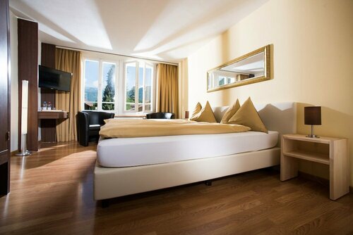 Гостиница Alpine-Inn by Jungfrau Hotel