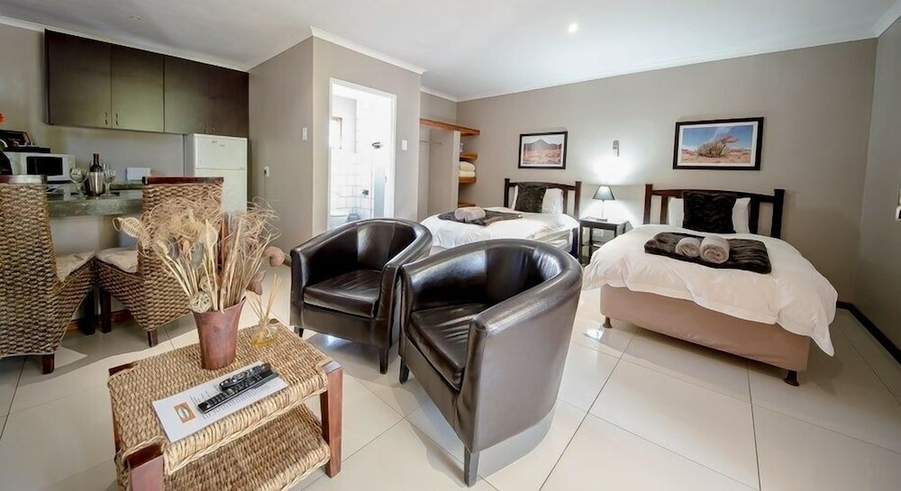 Фото Kleinplasie Guesthouse