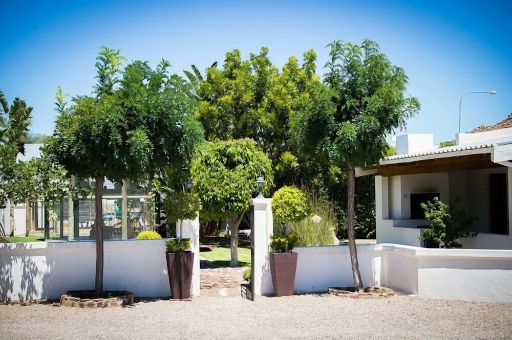 Фото Kleinplasie Guesthouse