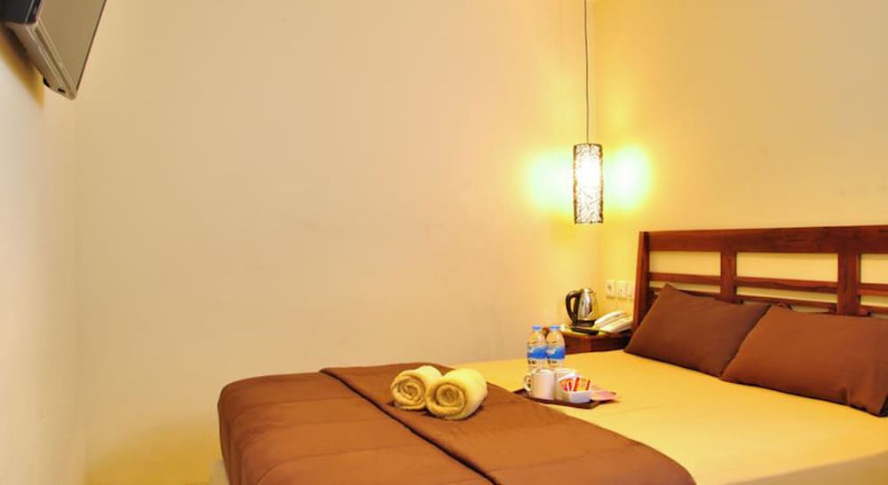 Фото Kuta Sari House