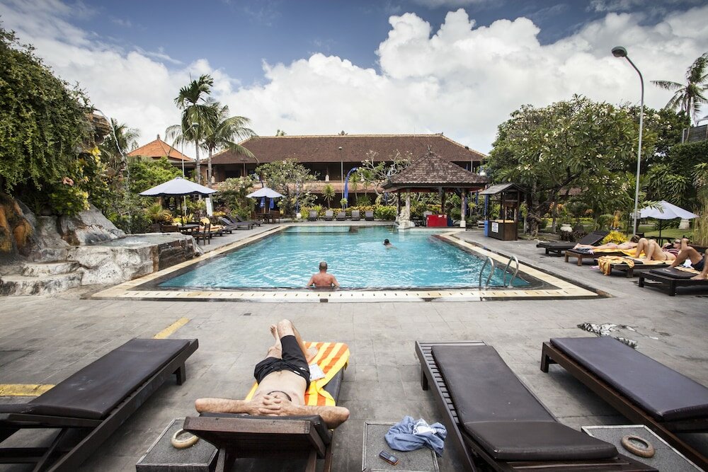 Фото Satriya Cottages