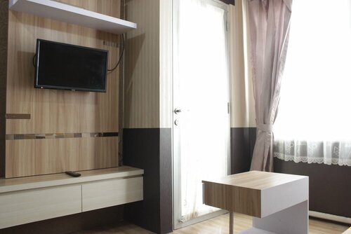 Гостиница Strategic 1br Apartment with Sofa Bed at The Jarrdin Cihampelas в Бандунге