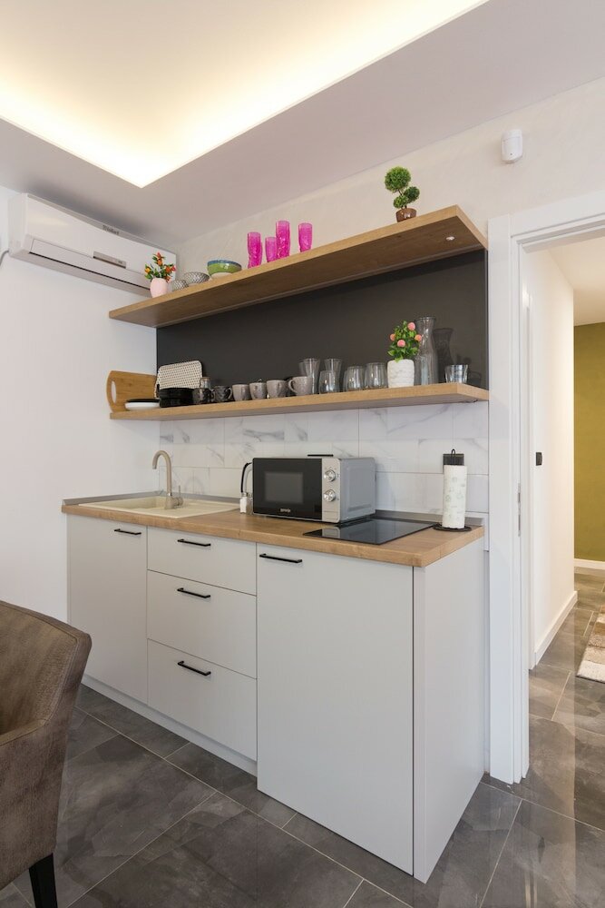 Фото Deluxe Feliciano Apartments