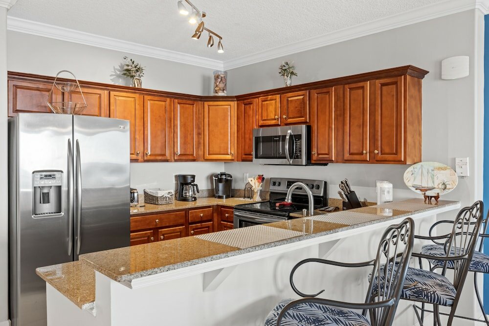 Фото Tropic Winds by Book That Condo