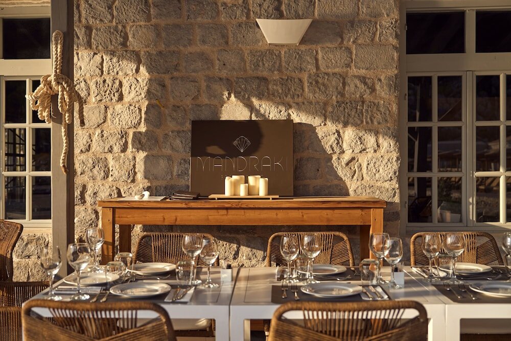 Фото Mandraki Beach Resort - Adults Only