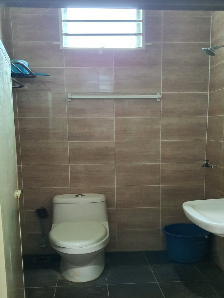 Фото Oyo Home 90496 Delima Homestay